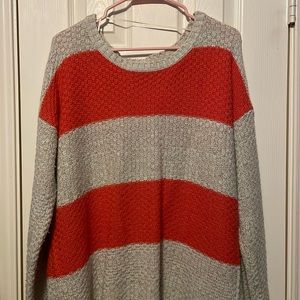 Orange and cream knit sweater